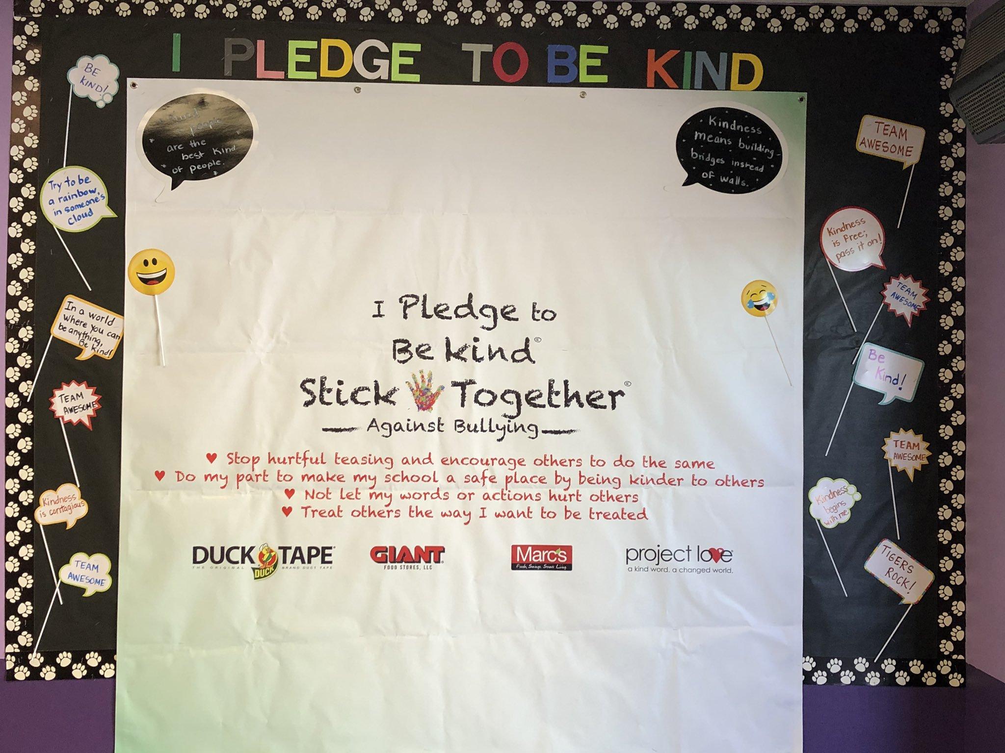 Picture of student pledge it states- I pledge to be kind, stick together against bulling. Stop hurtful teasing and encourage others to do the same